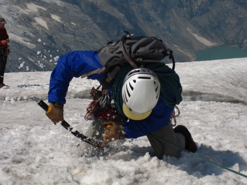 ice axe - on the forbidden glacier in the north cascades, dave ahrens digging...