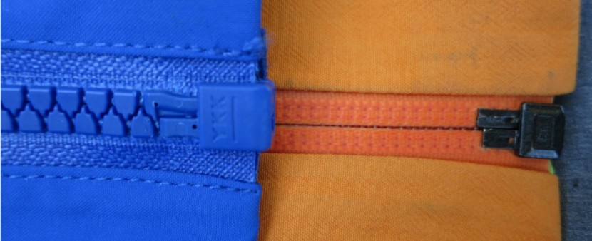 patagonia super alpine - the arcteryx alpha sv's zipper (blue) is much easier to pull than...