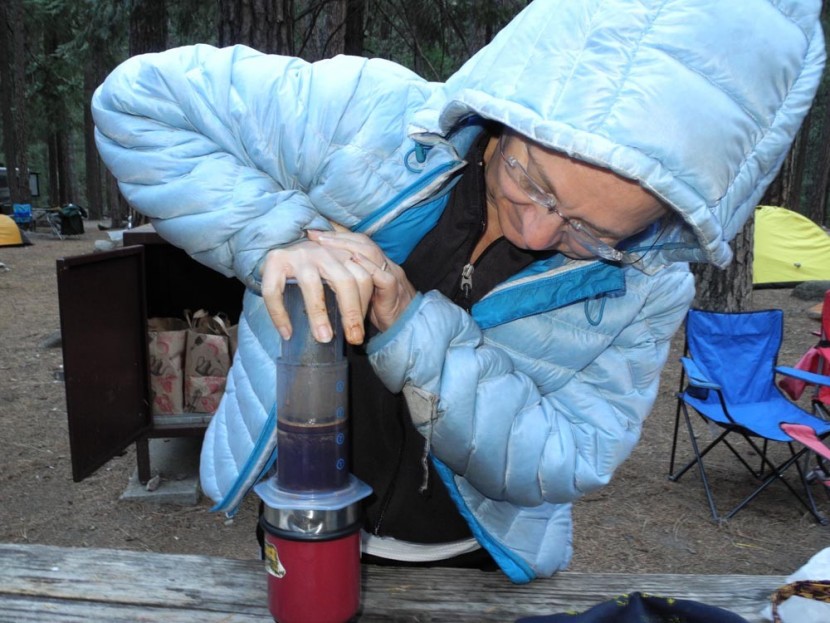 aeropress coffee maker - linda long pushing water through the aeropress on a cool morning in...