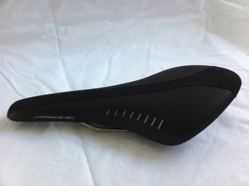 fizik arione - the long strip on suede-like material running the length of the...