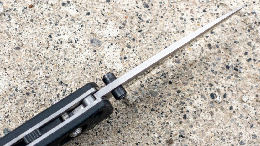 benchmade mini barrage 585 - detail of the mechanism that locks the knife closed. with an...