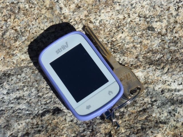 striiv smart - striiv in keychain mode. the purple is a rubbery sleeve that quiets...