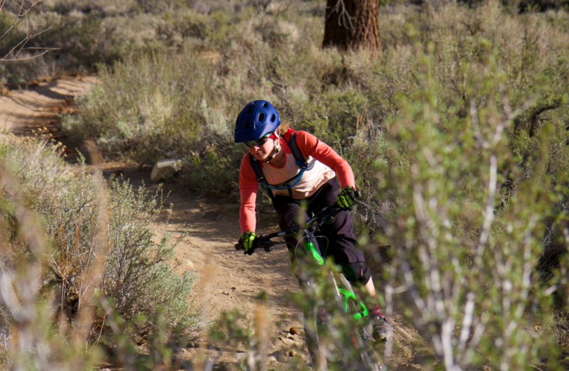 poc trabec - mckenzie long leaning into a corner on the lower rock creek trail.