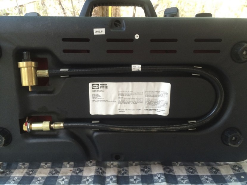 primus firehole 100 - the flexible fuel line stows beneath the stove.