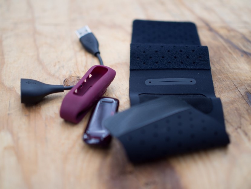 fitbit one - fitbit one and all of its included hardware. shown from left to...