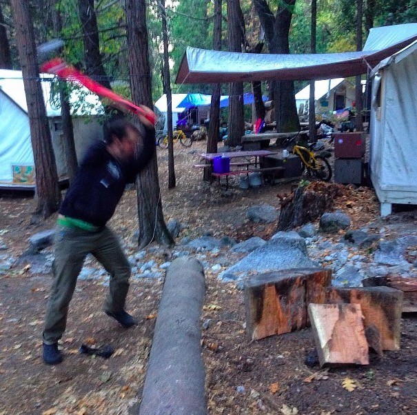 chopping wood for the campfire - essential for dutch oven cooking or...