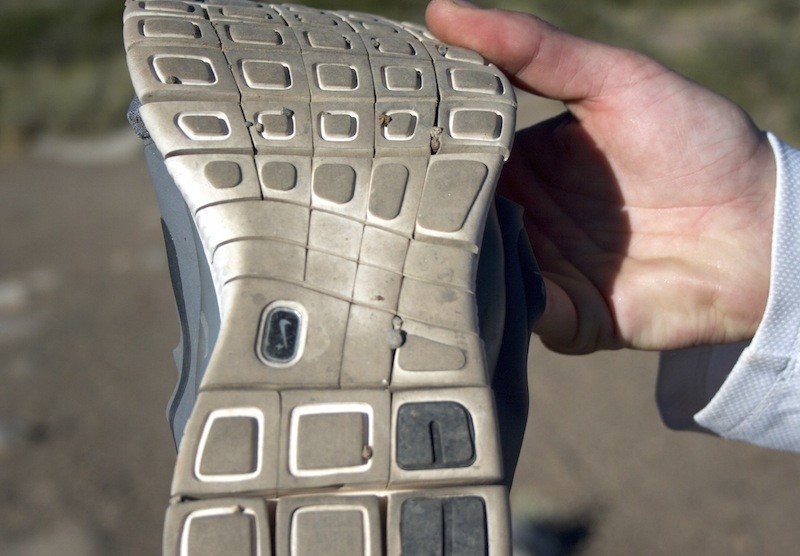 nike free 5.0 - small rocks and debris constantly gets stuck between the grooves in...
