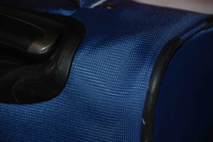 travelpro maxlite 5 22 expandable rollaboard - the maxlite was dented after checking it in. this sort of damage is...