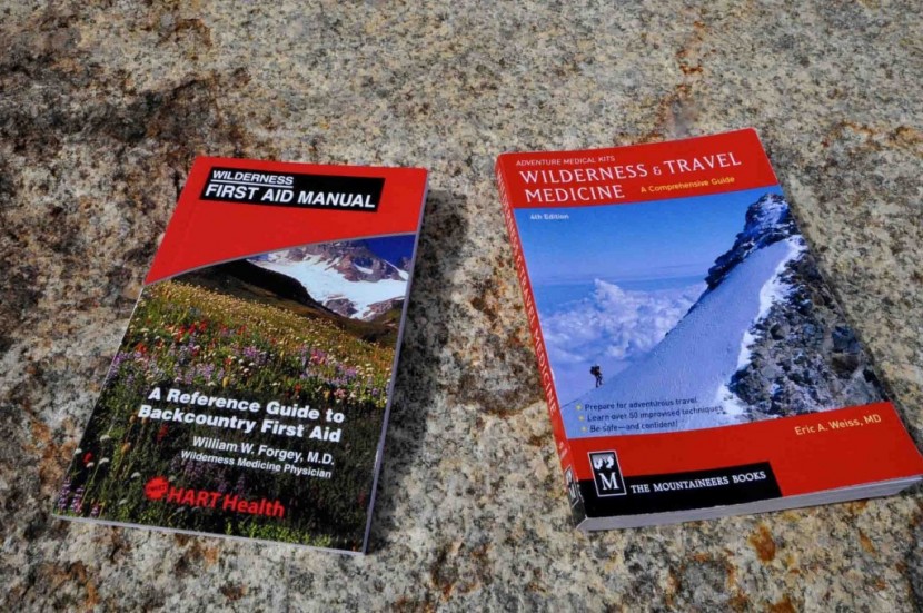 rei backpacker extended - this kit contains the wilderness first aid manual (left) which is...