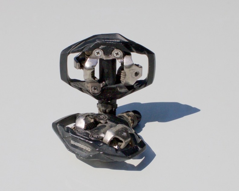 shimano m530 spd - each side of the pedal features an adjustment for spring tension...