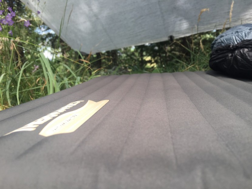 therm-a-rest neoair venture - this pad has a relatively smooth surface. as seen, the baffles are...