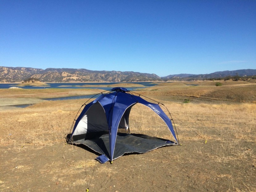 lightspeed quick canopy - side view of the back wall of this shelter. eight plastic stakes are...