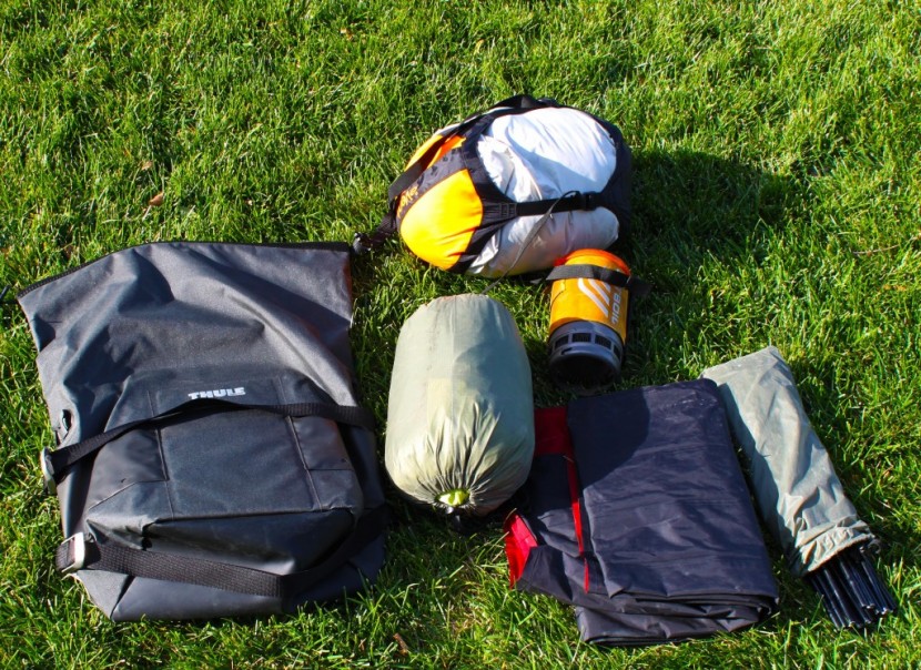 with an empty pannier, we prepare to perform our multi-day touring...
