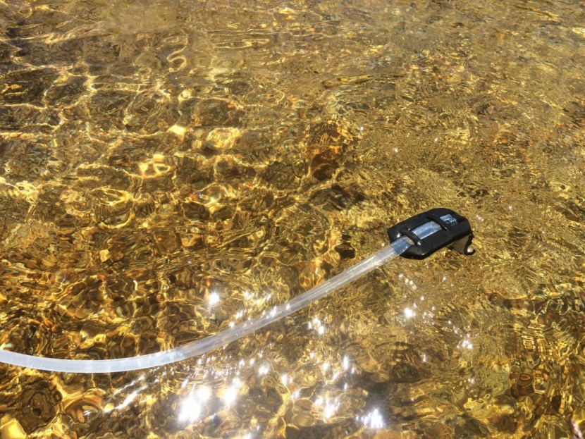 backpacking water filter - the guardian self cleans with every stroke, sucking water in through...