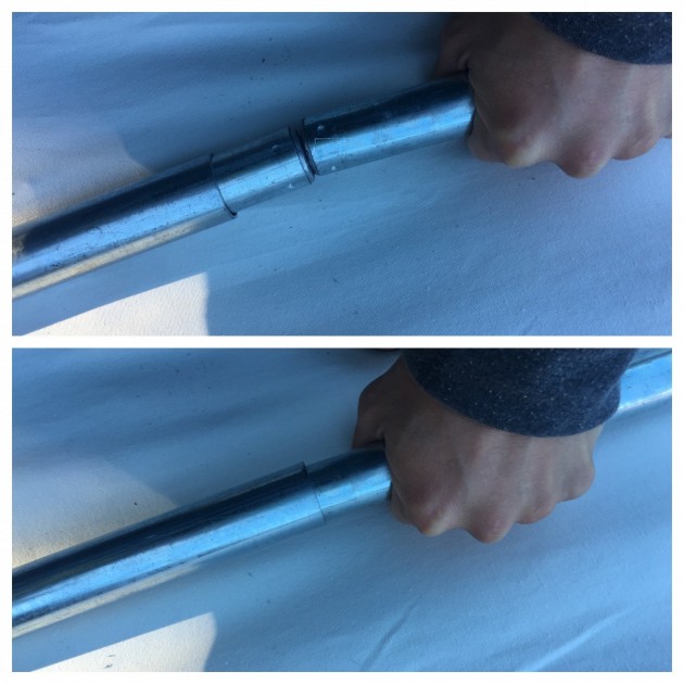 sliding the steel shaft over the tensioning joint at the top of the...