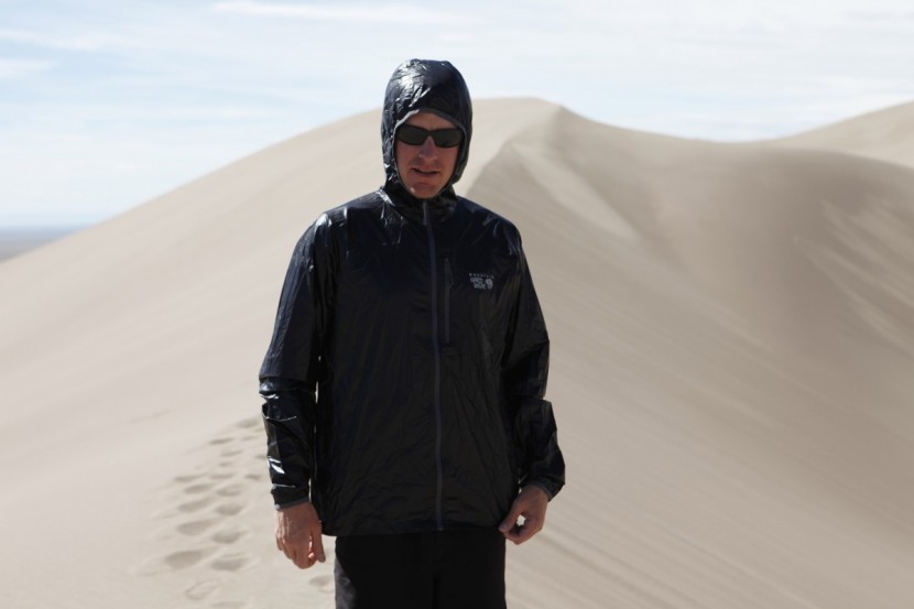 mountain hardwear ghost lite - our glossy black ghost lite jacket collected solar gain to warm us...