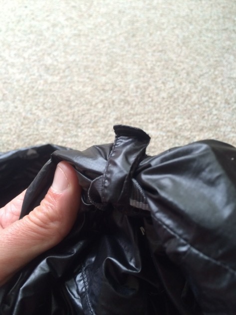 mountain hardwear ghost lite - the hood stowaway method of the ghost lite jacket uses two flaps of...