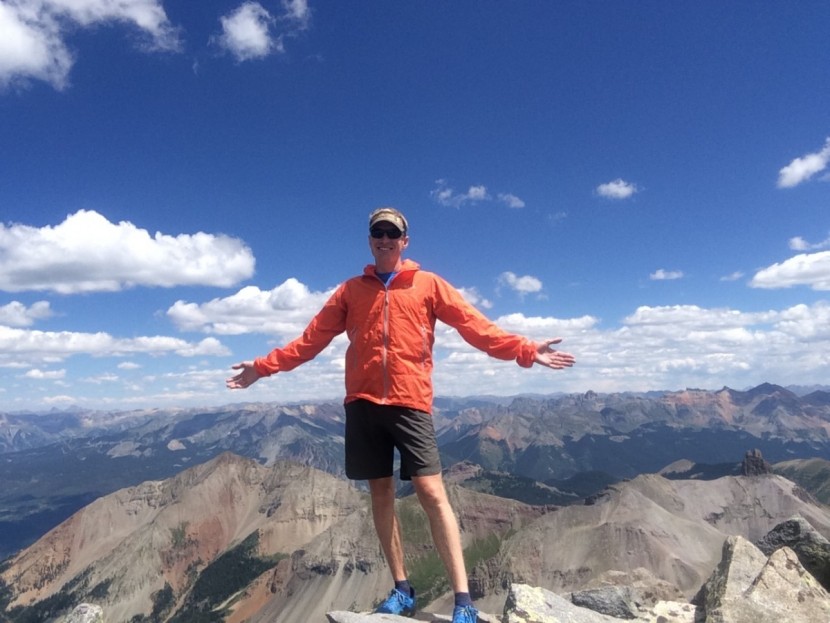 rab windveil jacket - our head tester wearing the rab windveil jacket on the summit of...