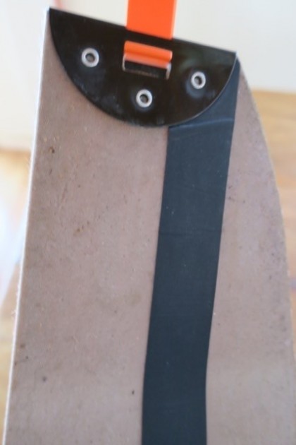 voile skins with tail clip - a view of the glue side of the voile splitboard skins near the tail...