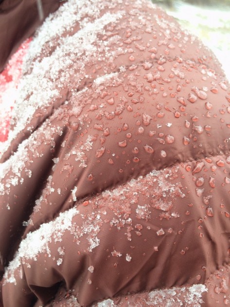 the north face trevail hoodie - a closeup of the way that a dwr coating works on the outside of a...