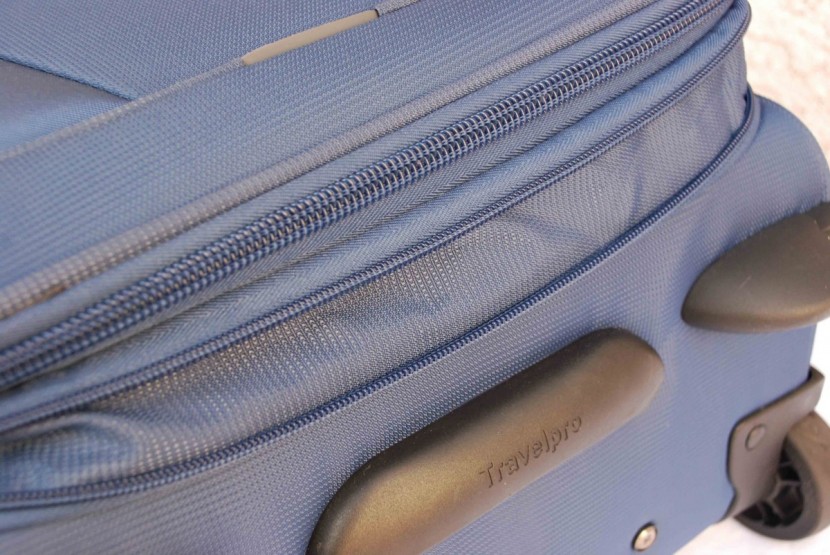 travelpro maxlite 5 22 expandable rollaboard - the expandable zipper helps you pack a little more when needed, like...