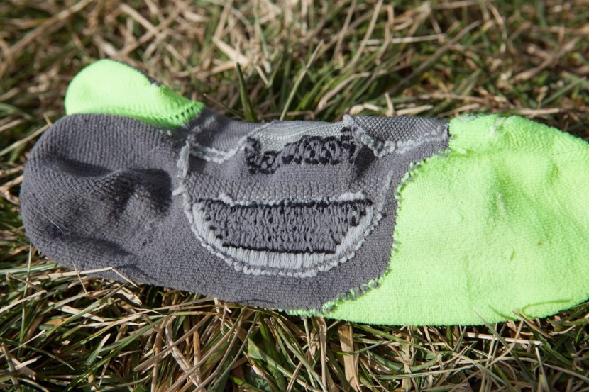 feetures! elite light cushion no show tab - the inside of the feetures! socks, showing how the cushioning runs...