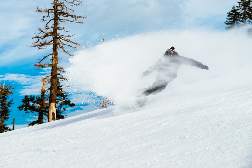 burton custom flying v - burton flying v during a slash spray. kurt wastell (rider).