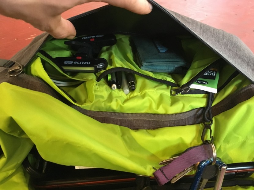 outdoor research rangefinder - the rangefinder messenger bag has a simple organizational system.