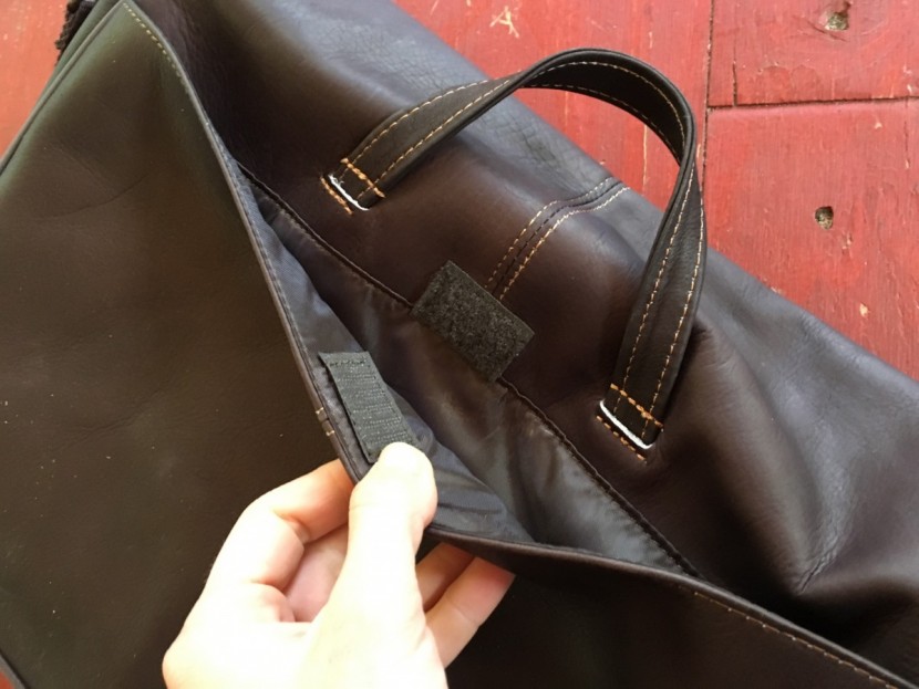 kenneth cole reaction risky business - the velcro tab that closed the back flap seemed like it was slapped...