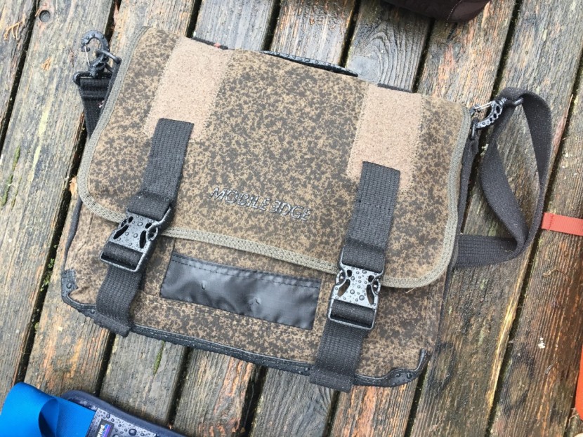 mobile edge eco - the eco messenger bag wetted out in the rain but kept our gear dry...