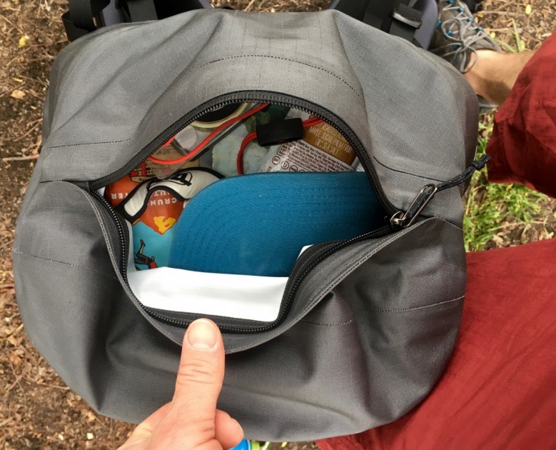 arc'teryx bora ar 63 - the primary zippered pocket on the lid of the bora 63. this lid is...