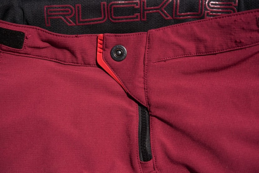 troy lee ruckus - velcro pull tabs for waist adjustment and a burly button and zipper...
