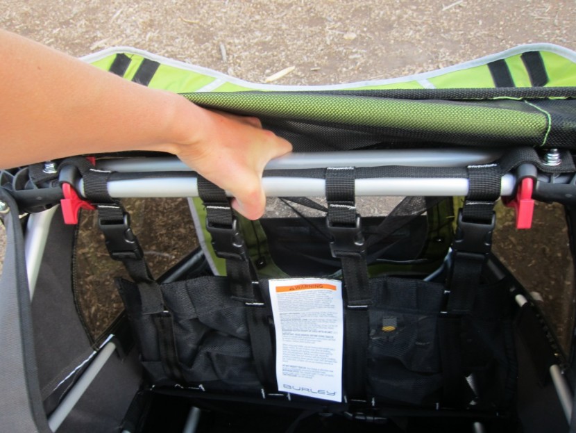 bike trailer - assembling and setting up the burley d'lite requires squeezing the...