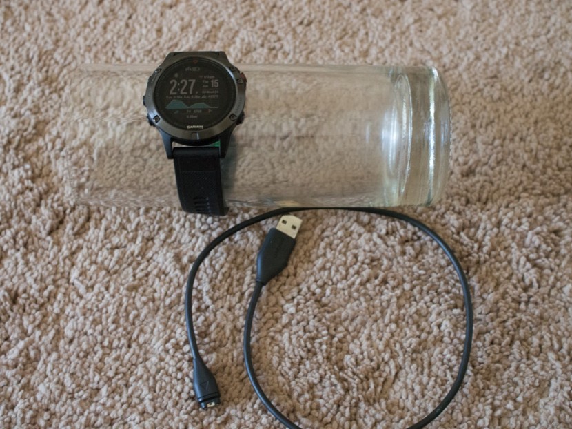 garmin fenix 5 - the fenix 5 and associated charging cable. we didn't think much of...