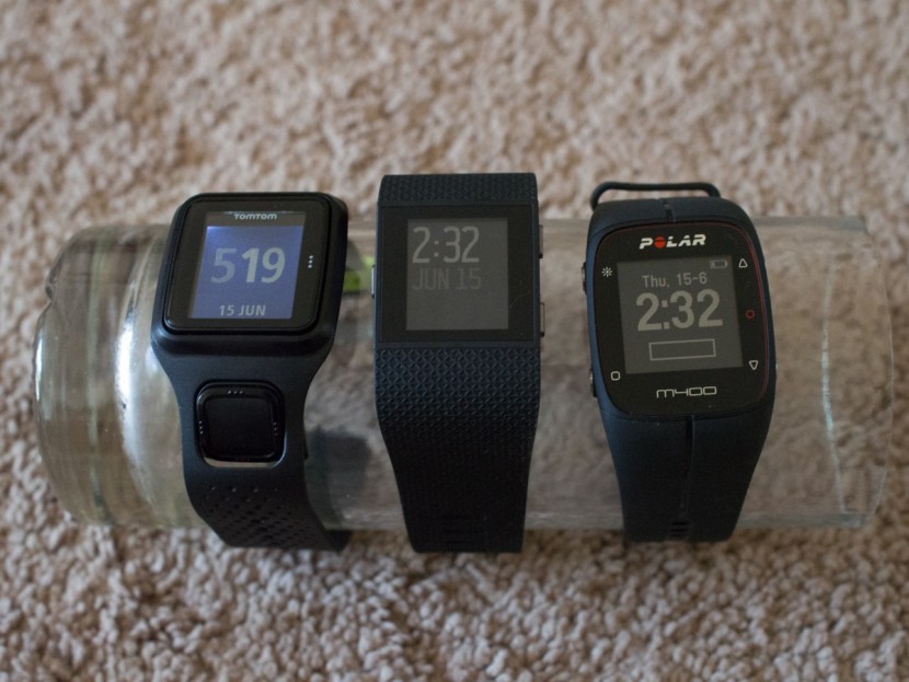 fitbit surge - the mid-sized gps watches we tested, left to right: tomtom runner...