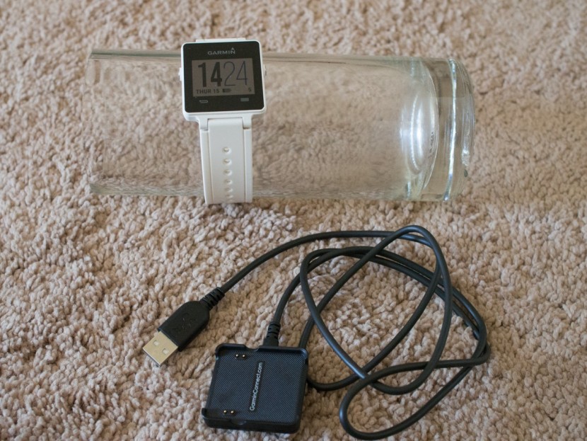 garmin vivoactive 3 - the vivoactive and its bulky charging cable/platform. however, this...