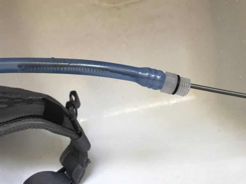 hydration pack - cleaning the drinking tube with a specialized brush, which did not...