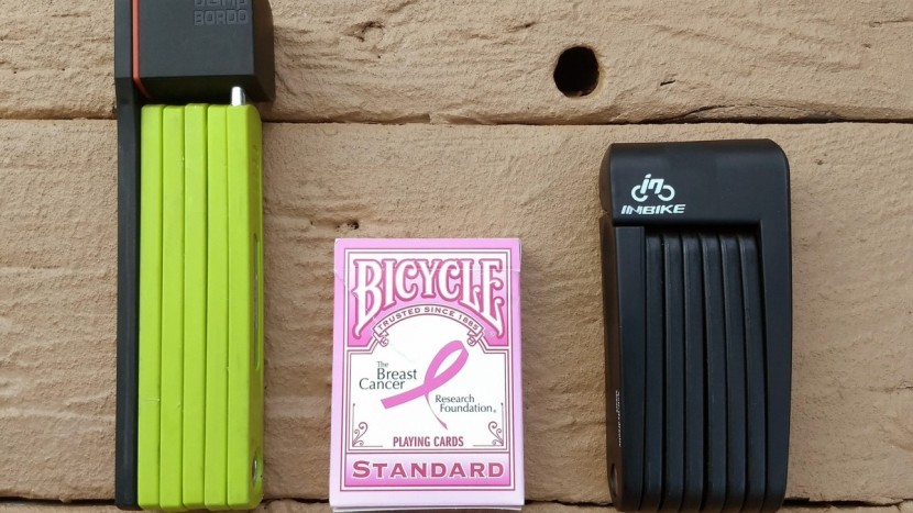 a standard deck of cards for size contrast between the abus model on...