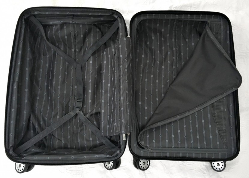 delsey helium titanium 25" - a spartan yet functional interior. we only wish the cinch strap was...