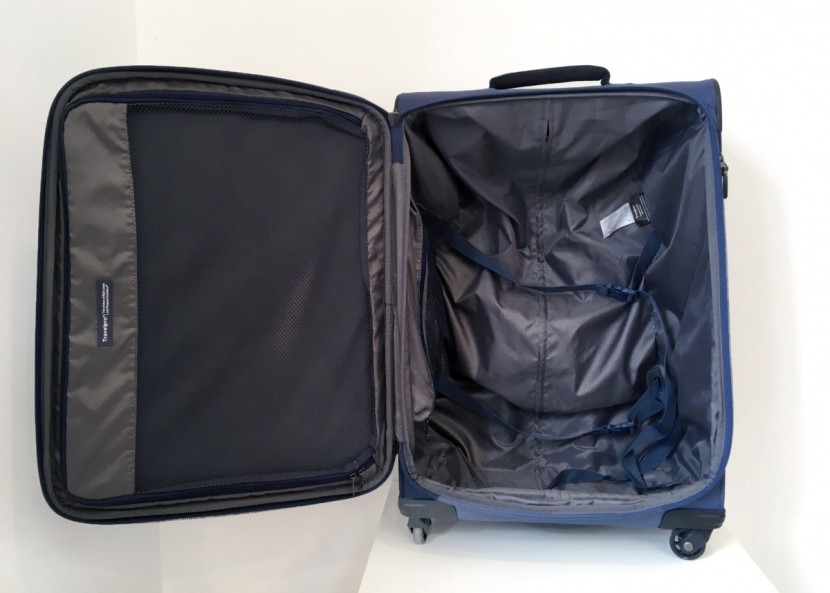 travelpro maxlite 4 25" - a simple yet functional storage area with dual cinchable straps.