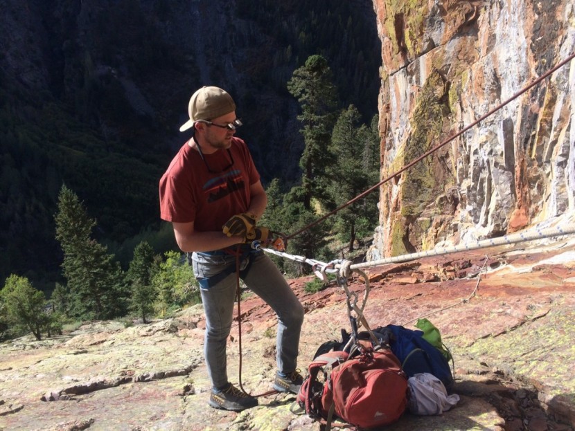 black diamond chaos - andrew lead belaying at a hanging belay on a precarious slab. the...