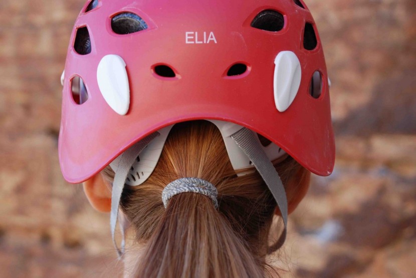 petzl elia for women - the omega headband has a notch for your ponytail, which relieves a...