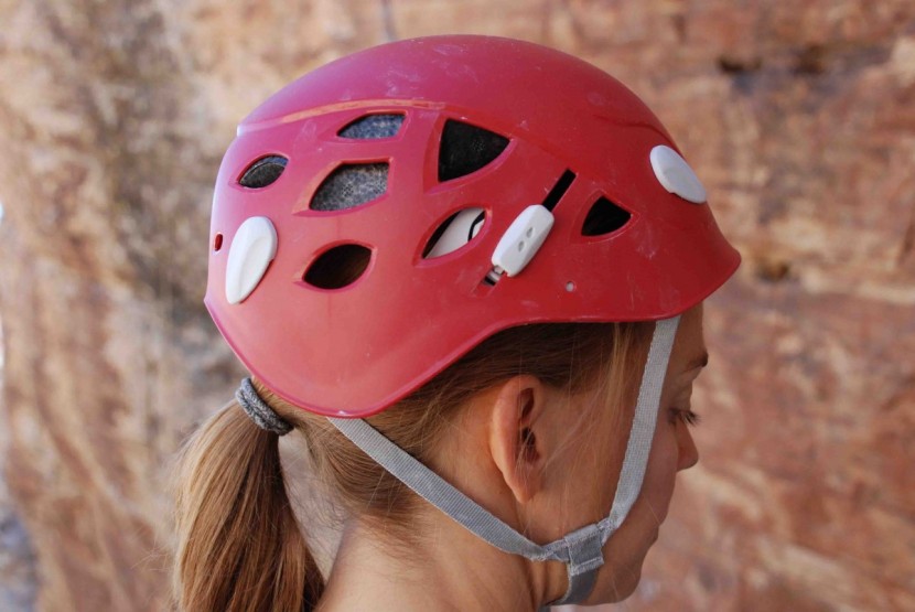 petzl elia for women - the tabs on the side of the helmet slide up and down to adjust the...