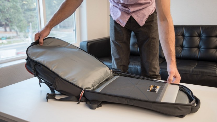 the north face surge - fully unzip the laptop compartment of the surge and lay it flat for...