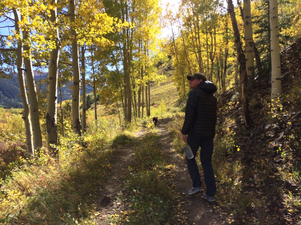 kuhl kontra air - on a leaf peeping hike in the autumn in the colorado mountains. the...