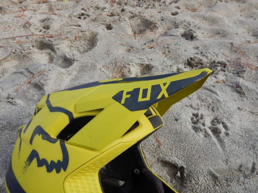 fox racing proframe - the visor is not adjustable on this helmet.