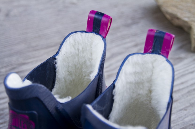 joules wellibob - a closer look at the synthetic "fur" lining and pull tabs of the...