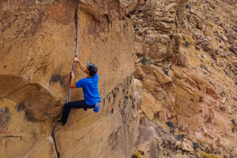evolv addict - these shoes float up cracks as thin as a .75 camalot.