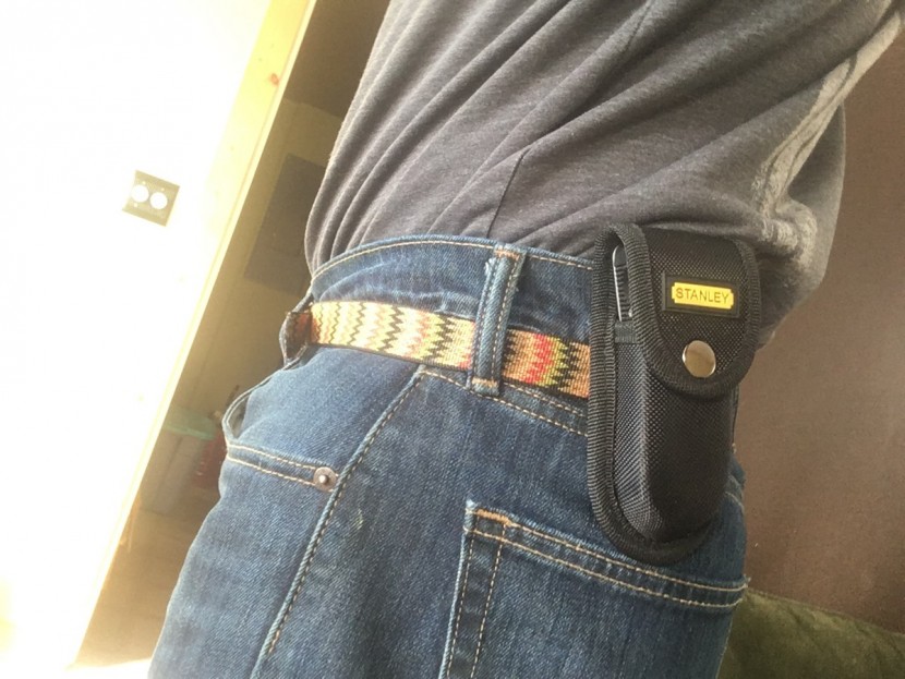 stanley 12 in 1 - the belt loop on the stanley sheath is located in the middle of the...