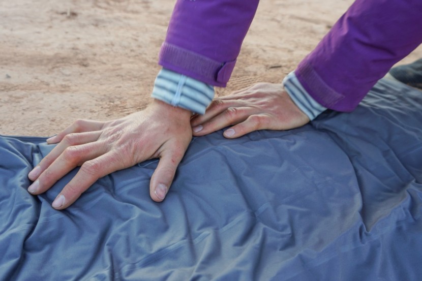 exped downmat 9 - a diagram on the pump indicates precise hand placement.